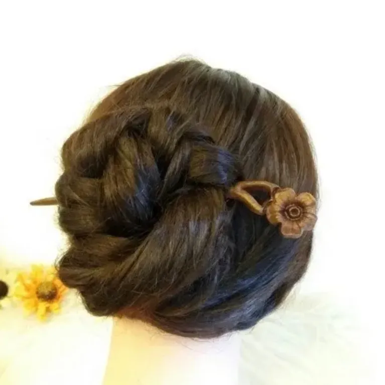 The Apricot Wooden Hair Stick, exuding elegance with its handmade craftsmanship, makes the perfect women's day gift for her or birthday gift for mom, offering a timeless touch of ancient accessories and a beautifully unique handmade gift
